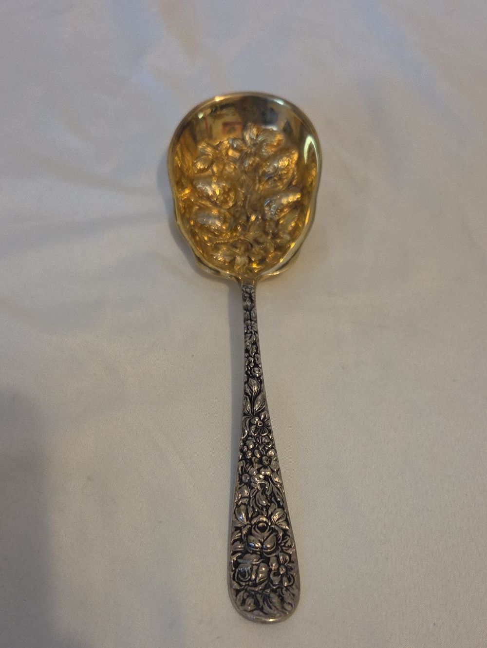Gold-Tone Floral Serving Spoon with Ornate Silver Handle